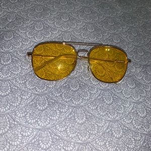 Edgy yellow tinted sunglasses